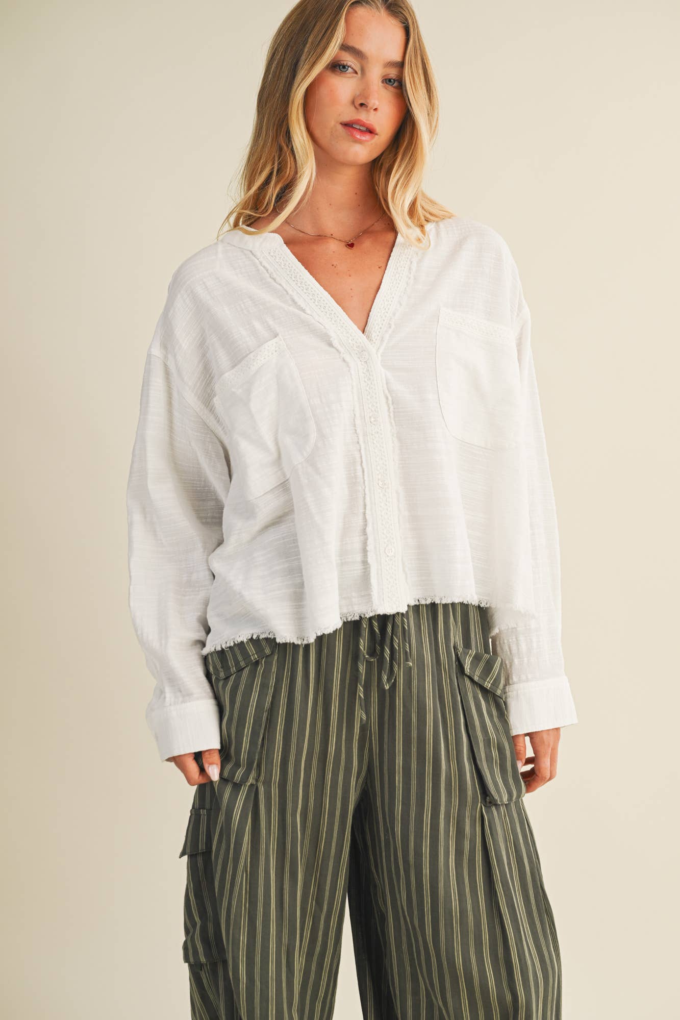 LACE-TRIMMED TOP WITH RAW-CUT EDGE DETAIL