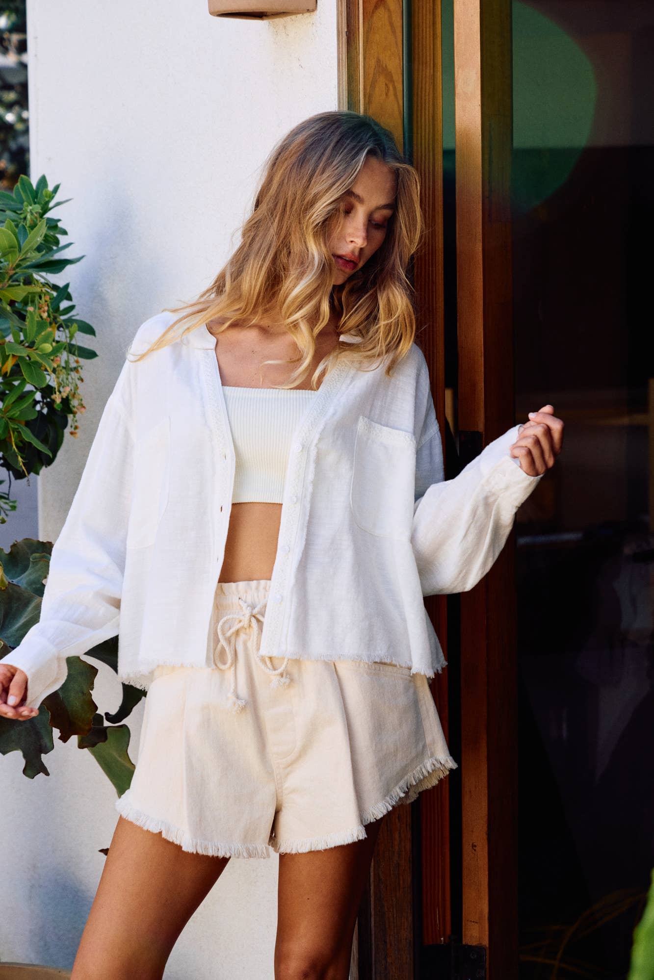 LACE-TRIMMED TOP WITH RAW-CUT EDGE DETAIL