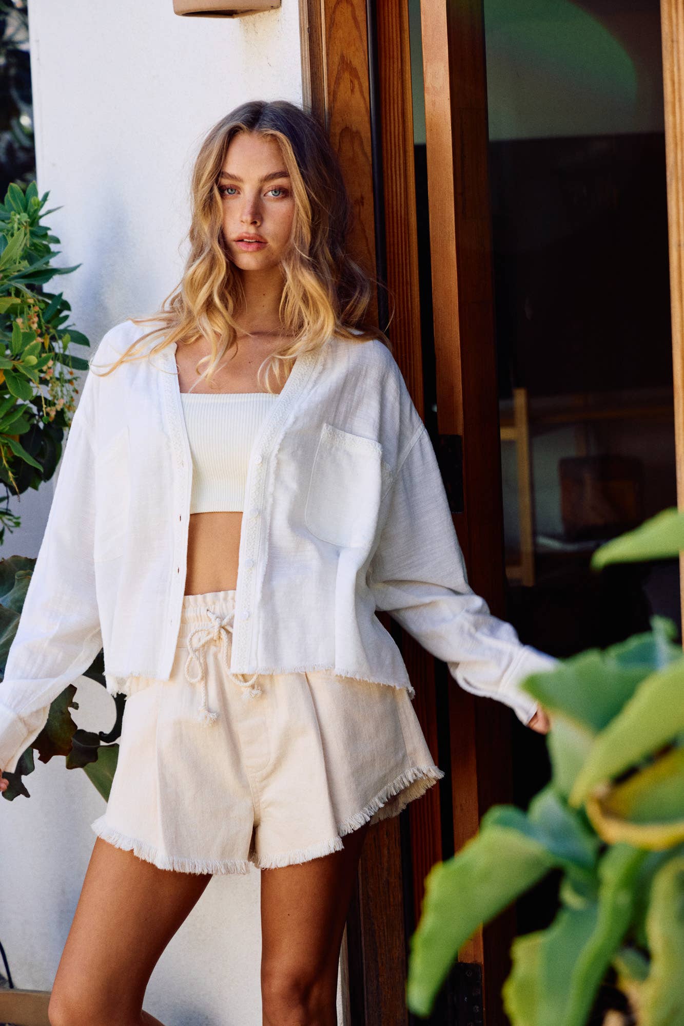 LACE-TRIMMED TOP WITH RAW-CUT EDGE DETAIL