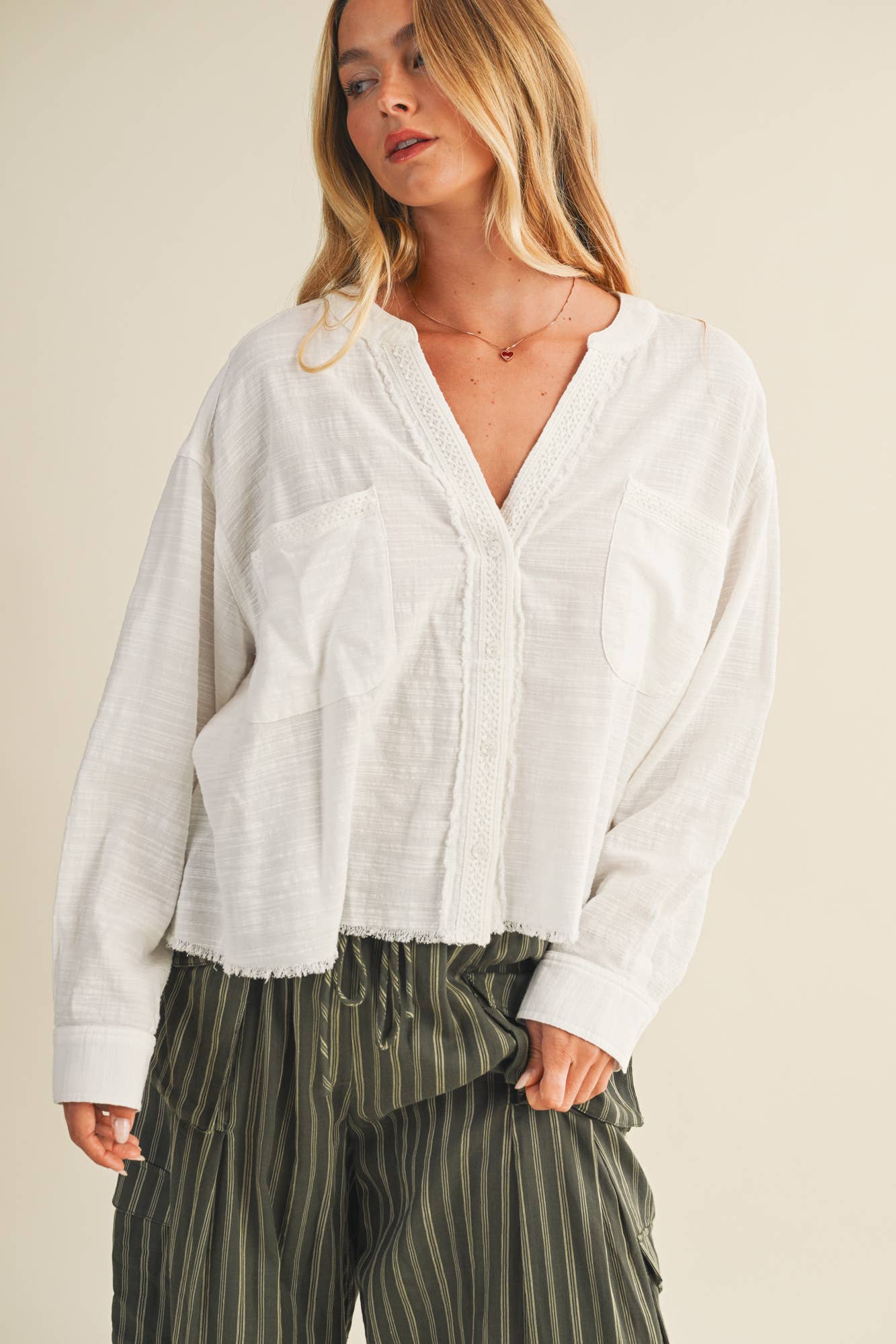 LACE-TRIMMED TOP WITH RAW-CUT EDGE DETAIL