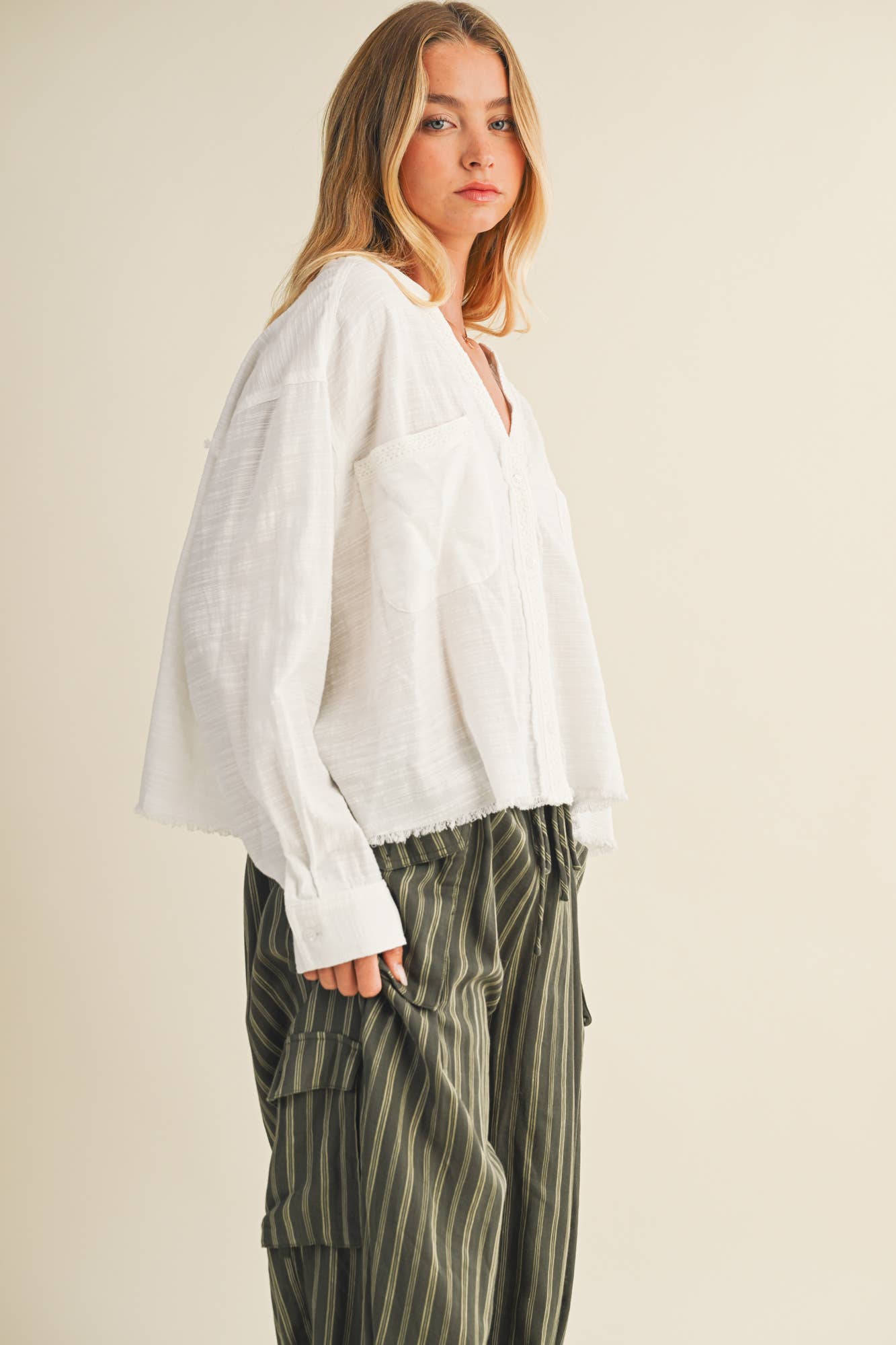 LACE-TRIMMED TOP WITH RAW-CUT EDGE DETAIL