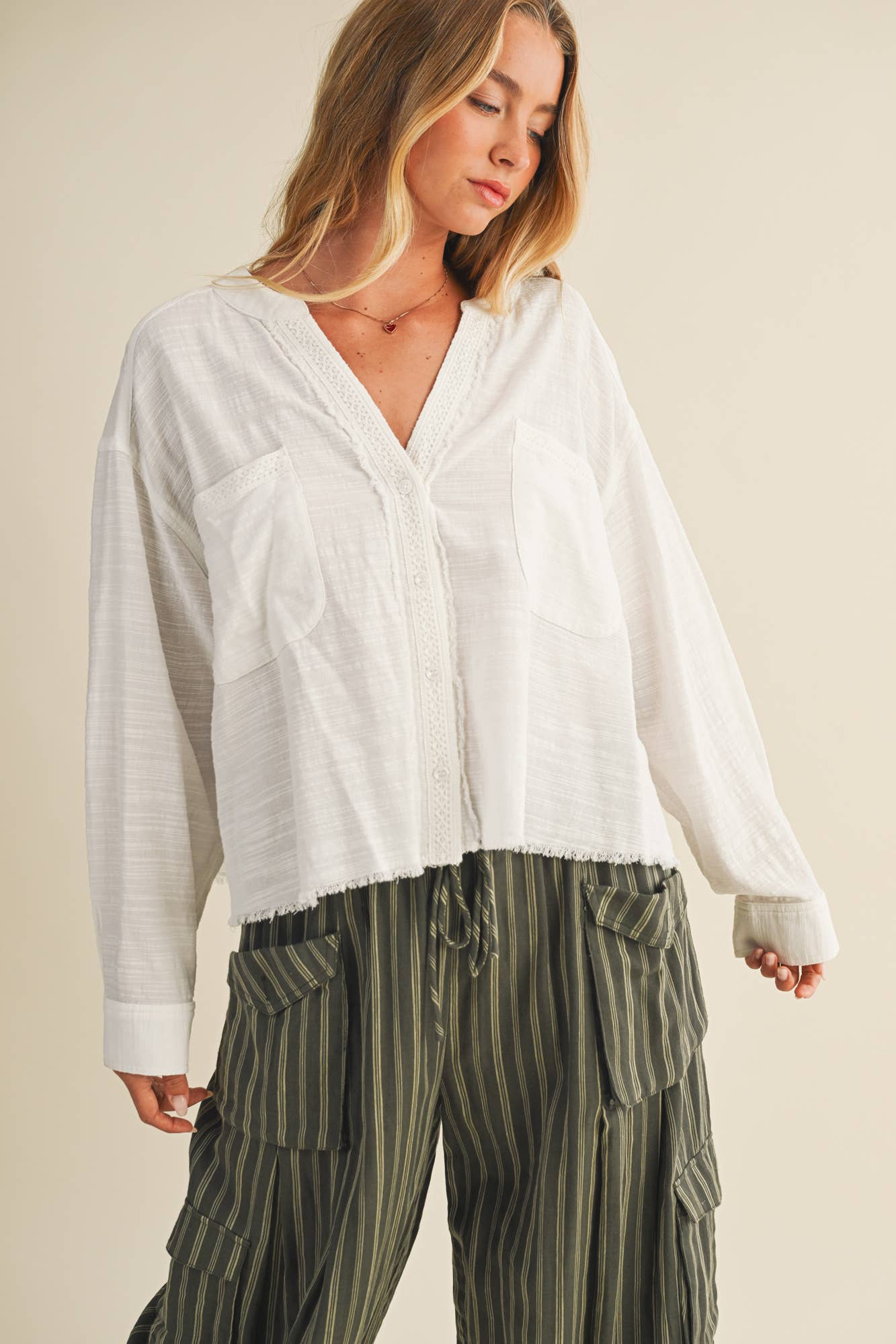 LACE-TRIMMED TOP WITH RAW-CUT EDGE DETAIL